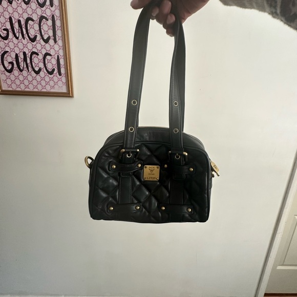 MCM Handbags - MCM Black and Gold Quilted Shoulder Bag